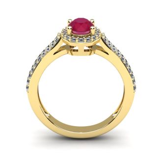 1 1/3 Carat Oval Shape Ruby and Halo Diamond Ring In 14 Karat Yellow Gold
