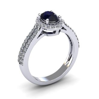 1 1/2 Carat Oval Shape Sapphire and Halo Diamond Ring In 14 Karat White Gold