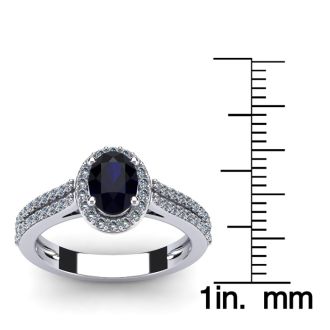 1 1/2 Carat Oval Shape Sapphire and Halo Diamond Ring In 14 Karat White Gold