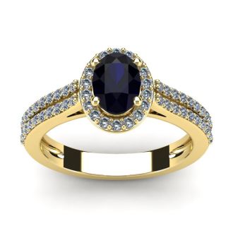 1 1/2 Carat Oval Shape Sapphire and Halo Diamond Ring In 14 Karat Yellow Gold
