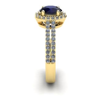 1 1/2 Carat Oval Shape Sapphire and Halo Diamond Ring In 14 Karat Yellow Gold