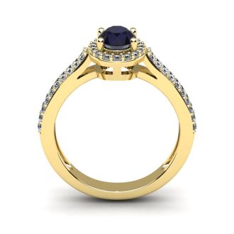 1 1/2 Carat Oval Shape Sapphire and Halo Diamond Ring In 14 Karat Yellow Gold