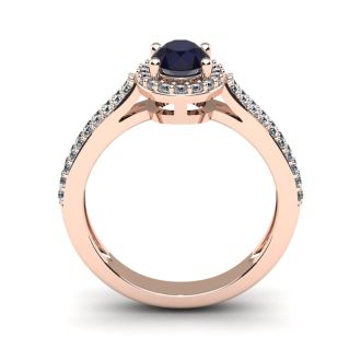 1 1/2 Carat Oval Shape Sapphire and Halo Diamond Ring In 14 Karat Rose Gold