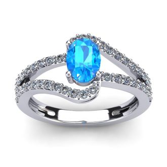 1 1/2 Carat Oval Shape Blue Topaz and Fancy Diamond Ring In 14 Karat White Gold