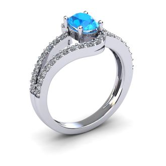 1 1/2 Carat Oval Shape Blue Topaz and Fancy Diamond Ring In 14 Karat White Gold