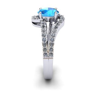 1 1/2 Carat Oval Shape Blue Topaz and Fancy Diamond Ring In 14 Karat White Gold