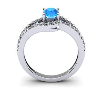 1 1/2 Carat Oval Shape Blue Topaz and Fancy Diamond Ring In 14 Karat White Gold