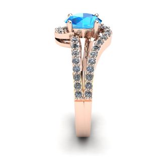1 1/2 Carat Oval Shape Blue Topaz and Fancy Diamond Ring In 14 Karat Rose Gold