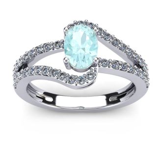 Aquamarine Ring: Aquamarine Jewelry: 1 1/4 Carat Oval Shape Aquamarine and Fancy Diamond Ring In 14 Karat White Gold