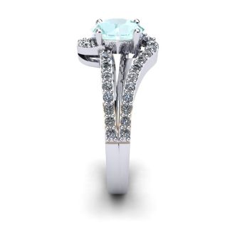 Aquamarine Ring: Aquamarine Jewelry: 1 1/4 Carat Oval Shape Aquamarine and Fancy Diamond Ring In 14 Karat White Gold