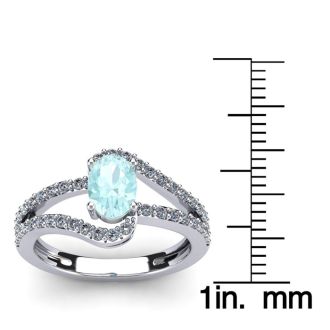 Aquamarine Ring: Aquamarine Jewelry: 1 1/4 Carat Oval Shape Aquamarine and Fancy Diamond Ring In 14 Karat White Gold