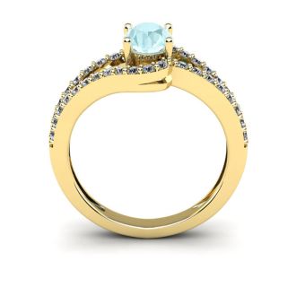 Aquamarine Ring: Aquamarine Jewelry: 1 1/4 Carat Oval Shape Aquamarine and Fancy Diamond Ring In 14 Karat Yellow Gold