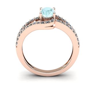 1 1/4 Carat Oval Shape Aquamarine and Fancy Diamond Ring In 14 Karat Rose Gold