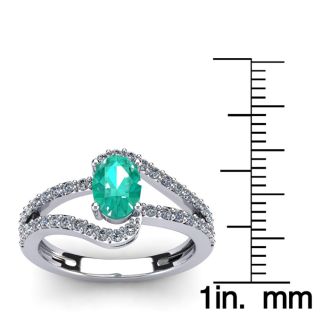 1 1/4 Carat Oval Shape Emerald and Fancy Diamond Ring In 14 Karat White Gold