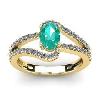 1 1/4 Carat Oval Shape Emerald and Fancy Diamond Ring In 14 Karat Yellow Gold