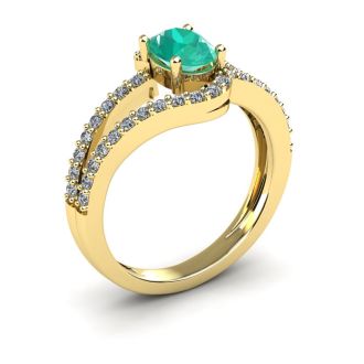 1 1/4 Carat Oval Shape Emerald and Fancy Diamond Ring In 14 Karat Yellow Gold