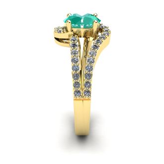 1 1/4 Carat Oval Shape Emerald and Fancy Diamond Ring In 14 Karat Yellow Gold