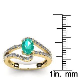 1 1/4 Carat Oval Shape Emerald and Fancy Diamond Ring In 14 Karat Yellow Gold