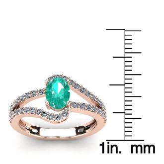 1 1/4 Carat Oval Shape Emerald and Fancy Diamond Ring In 14 Karat Rose Gold