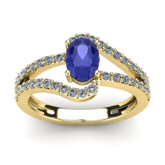 1 1/3 Carat Oval Shape Tanzanite and Fancy Diamond Ring In 14 Karat Yellow Gold