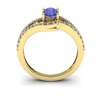1 1/3 Carat Oval Shape Tanzanite and Fancy Diamond Ring In 14 Karat Yellow Gold