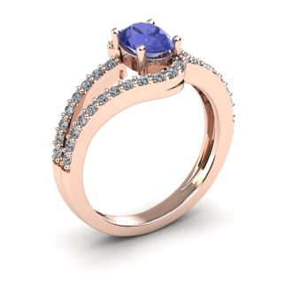 1 1/3 Carat Oval Shape Tanzanite and Fancy Diamond Ring In 14 Karat Rose Gold
