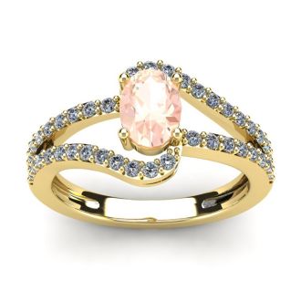 1 1/4 Carat Oval Shape Morganite and Fancy Diamond Ring In 14 Karat Yellow Gold