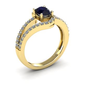 1 1/2 Carat Oval Shape Sapphire and Fancy Diamond Ring In 14 Karat Yellow Gold