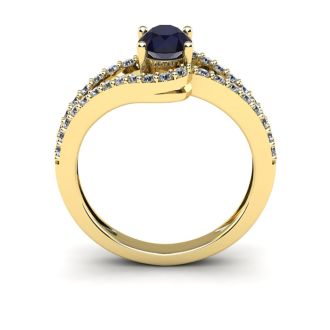 1 1/2 Carat Oval Shape Sapphire and Fancy Diamond Ring In 14 Karat Yellow Gold