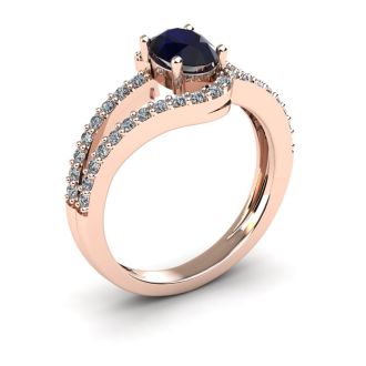 1 1/2 Carat Oval Shape Sapphire and Fancy Diamond Ring In 14 Karat Rose Gold