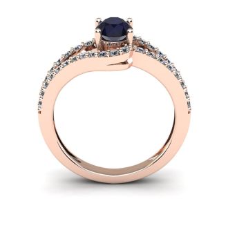 1 1/2 Carat Oval Shape Sapphire and Fancy Diamond Ring In 14 Karat Rose Gold