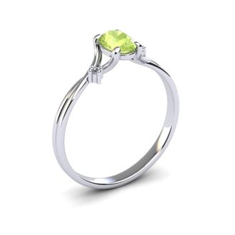 1/2 Carat Oval Shape Peridot and Two Diamond Accent Ring In 14 Karat White Gold
