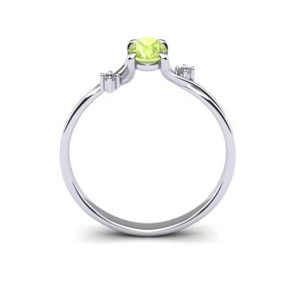 1/2 Carat Oval Shape Peridot and Two Diamond Accent Ring In 14 Karat White Gold