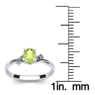1/2 Carat Oval Shape Peridot and Two Diamond Accent Ring In 14 Karat White Gold