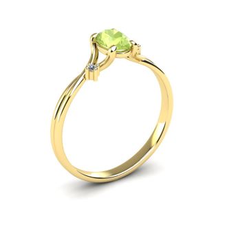1/2 Carat Oval Shape Peridot and Two Diamond Accent Ring In 14 Karat Yellow Gold