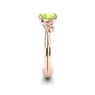 1/2 Carat Oval Shape Peridot and Two Diamond Accent Ring In 14 Karat Rose Gold