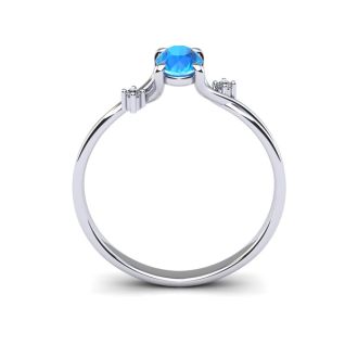 1/2 Carat Oval Shape Blue Topaz and Two Diamond Accent Ring In 14 Karat White Gold