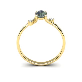 1/2 Carat Oval Shape Mystic Topaz Ring With Two Diamonds In 14 Karat Yellow Gold