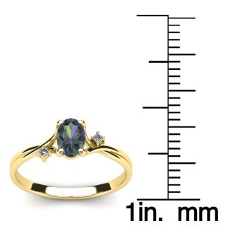 1/2 Carat Oval Shape Mystic Topaz and Two Diamond Accent Ring In 14 Karat Yellow Gold