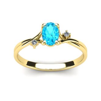 Aquamarine Ring: Aquamarine Jewelry: 1/2 Carat Oval Shape Aquamarine and Two Diamond Accent Ring In 14 Karat Yellow Gold