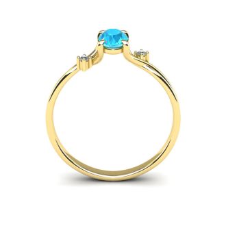 Aquamarine Ring: Aquamarine Jewelry: 1/2 Carat Oval Shape Aquamarine and Two Diamond Accent Ring In 14 Karat Yellow Gold