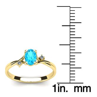 Aquamarine Ring: Aquamarine Jewelry: 1/2 Carat Oval Shape Aquamarine and Two Diamond Accent Ring In 14 Karat Yellow Gold