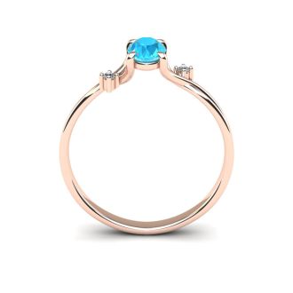 Aquamarine Ring: Aquamarine Jewelry: 1/2 Carat Oval Shape Aquamarine and Two Diamond Accent Ring In 14 Karat Rose Gold