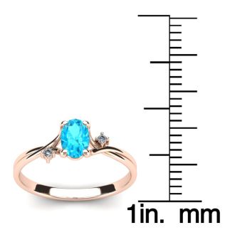 Aquamarine Ring: Aquamarine Jewelry: 1/2 Carat Oval Shape Aquamarine and Two Diamond Accent Ring In 14 Karat Rose Gold