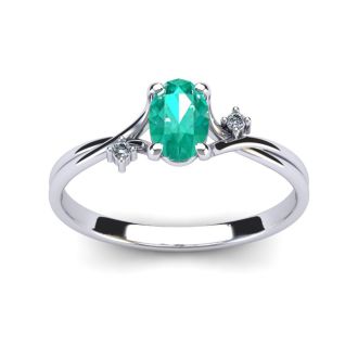 1/2 Carat Oval Shape Emerald and Two Diamond Accent Ring In 14 Karat White Gold