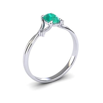 1/2 Carat Oval Shape Emerald and Two Diamond Accent Ring In 14 Karat White Gold
