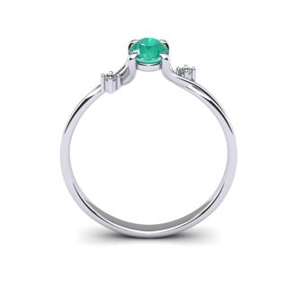 1/2 Carat Oval Shape Emerald and Two Diamond Accent Ring In 14 Karat White Gold