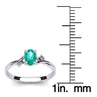 1/2 Carat Oval Shape Emerald and Two Diamond Accent Ring In 14 Karat White Gold
