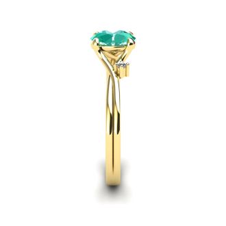 1/2 Carat Oval Shape Emerald and Two Diamond Accent Ring In 14 Karat Yellow Gold