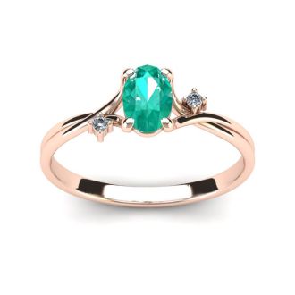 1/2 Carat Oval Shape Emerald and Two Diamond Accent Ring In 14 Karat Rose Gold